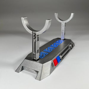 Light up Star Wars lightsaber display stand with blue lighting
