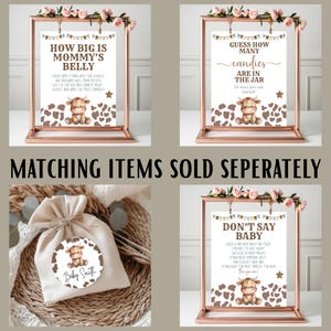 May include: Four baby shower game signs in rose gold frames, adorned with flowers. The signs feature text such as "How Big is Mommy's Belly", "Guess How Many Candies", and "Don't Say Baby". A small gift bag with a matching tag is also shown.