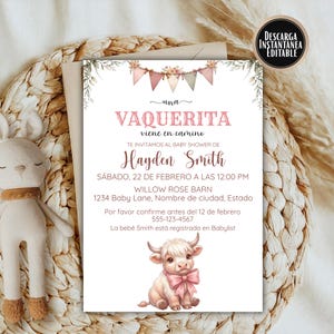 May include: A baby shower invitation with the text "una VAQUERITA viene en camino" in pink. The invitation includes details for Hayden Smith's baby shower, featuring a watercolor illustration of a cow with a pink bow. The invitation is set against a woven background.
