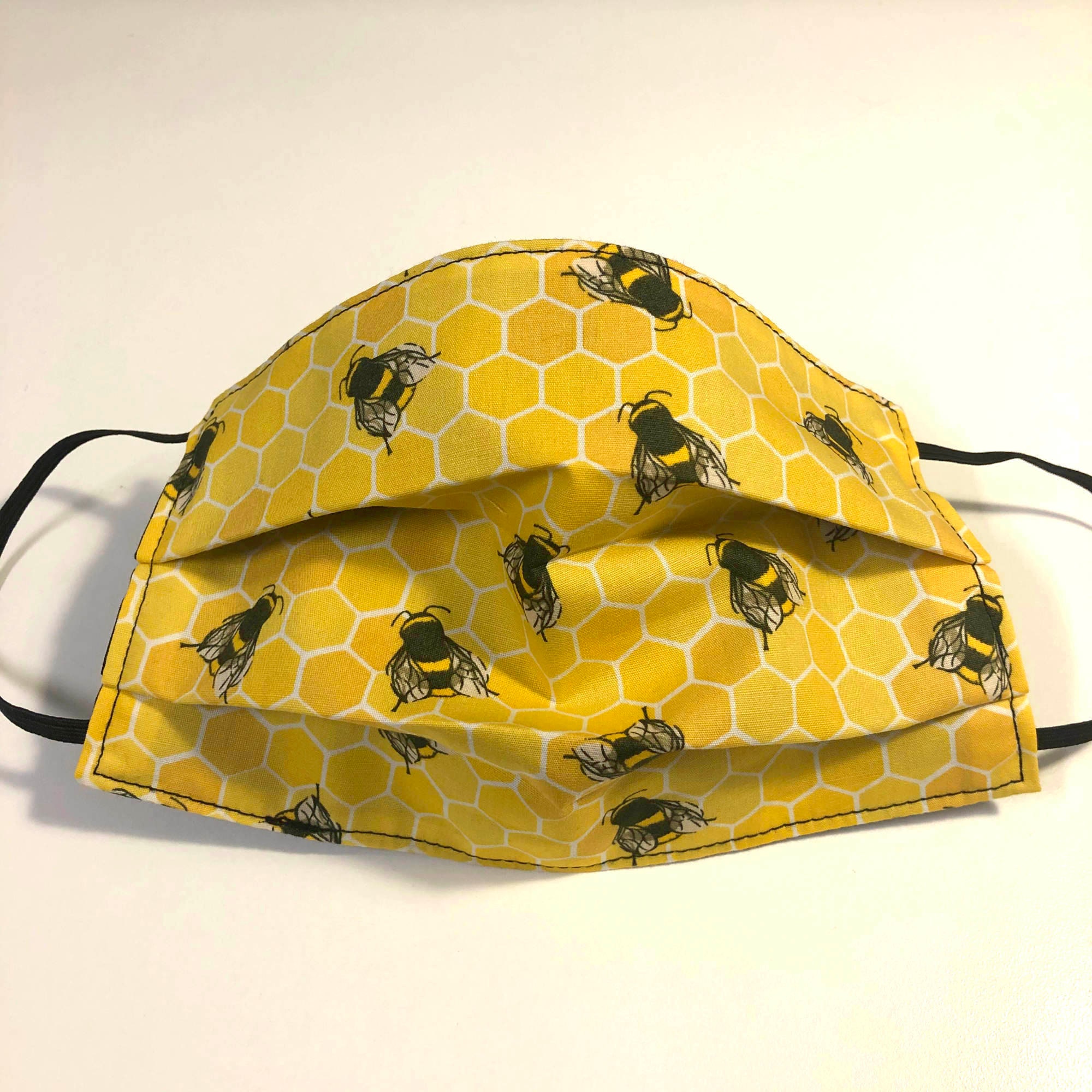 Bee and honeycomb print 2- or 3-layered face covering / mask. Washabl…