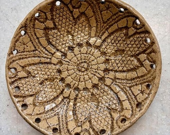 Pottery insert for coiled basket making.