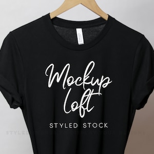 May include: Black t-shirt mockup with the text "Mockup Loft" and "Styled Stock" in white lettering.