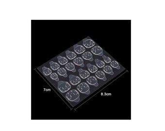 May include: A sheet of 48 clear adhesive tabs for attaching false nails. The sheet measures 7 inches by 8.3 inches.