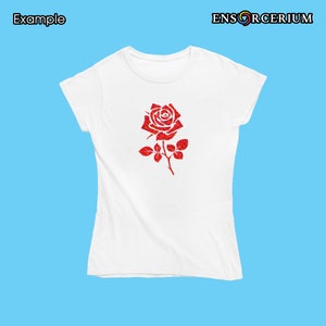 May include: White t-shirt with a red glitter rose design.
