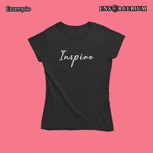 May include: Black women's t-shirt with the word "Inspire" written in white cursive script.