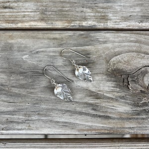 Earrings of Hill Tribe Thai Silver Flower Printed Leaves with Dangling Drops of White Freshwater Pearl.  Silpada and Sundance Style.