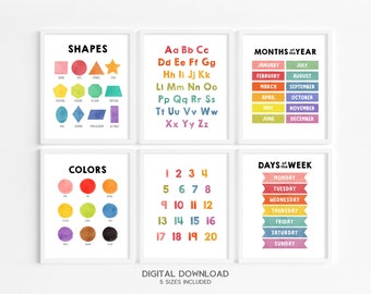 May include: Six framed educational prints with white borders. The prints display shapes, the alphabet, months of the year, colors, numbers 1-20, and days of the week. The text "DIGITAL DOWNLOAD" and "5 SIZES INCLUDED" are at the bottom.