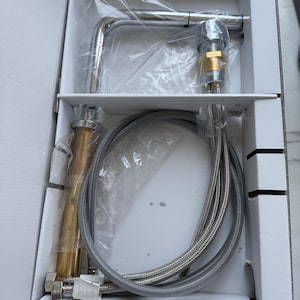 Faucet tap lowerable with shower