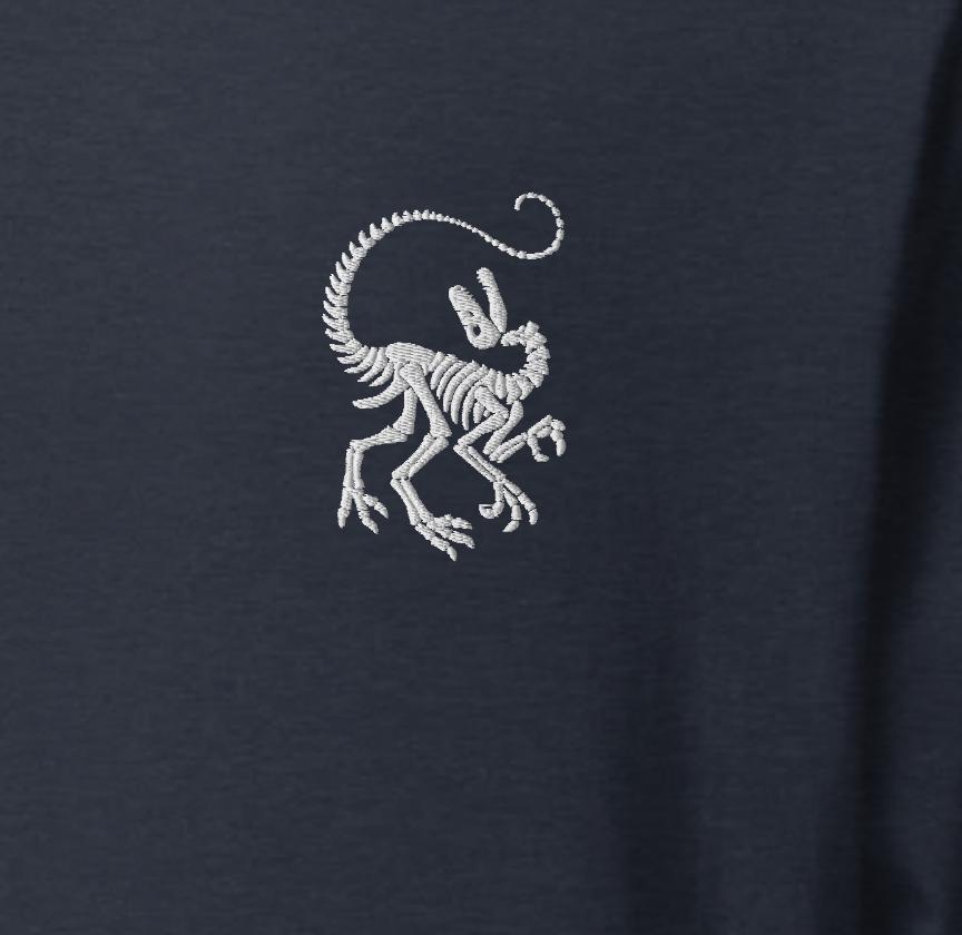 Embroidered Raptor Skeleton Shirt – Velociraptor Fossil Tee – Dinosaur Bones Graphic T-Shirt – Paleontology Gift – Dark Shirt with Light Ink
