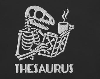 Thesaurus Embroidered T-Shirt – Dinosaur Reading Design for Book Lovers, Word Nerds – Fossil-Inspired Humor Shirt - "Bone & Beyond Series"