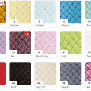 May include: A colour chart of yarn samples in various colours, including mustard yellow, light yellow, light blue, turquoise, light green, light purple, dark purple, light pink, green, white, red, black, cream, grey, and pink. The chart is labelled with numbers and Turkish names for each colour.