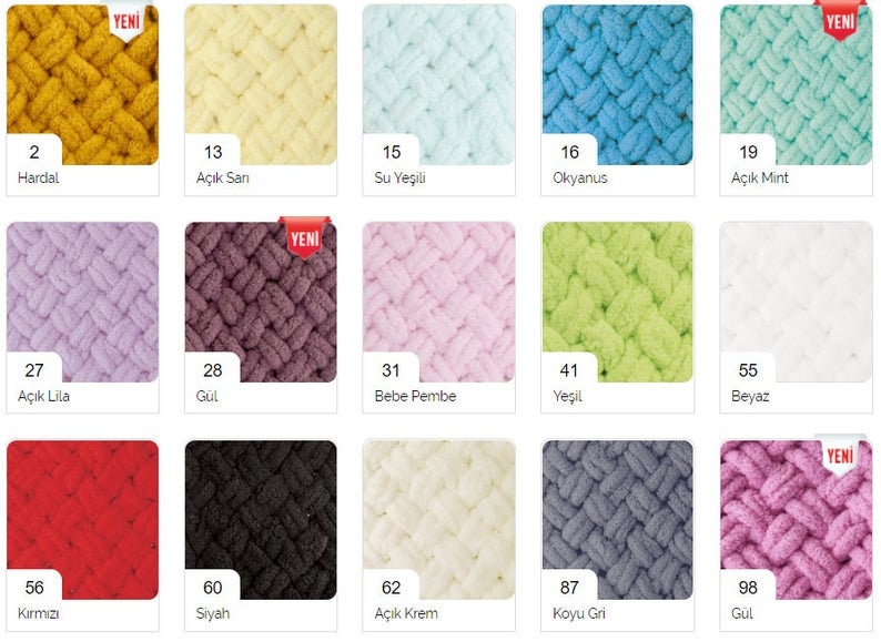 May include: A colour chart of yarn samples in various colours, including mustard yellow, light yellow, light blue, turquoise, light green, light purple, dark purple, light pink, green, white, red, black, cream, grey, and pink. The chart is labelled with numbers and Turkish names for each colour.