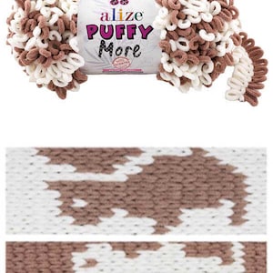 May include: A skein of brown and white yarn called "Alize Puffy More" with a textured, puffy look.
