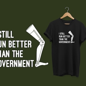 Leg Amputee Shirt / Funny Gift For Leg Amputees / I Still Run Better Than The Government / Amputee Humor Unisex T-Shirt