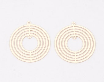 4 dijes circulares en oro