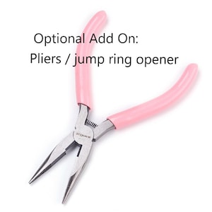 May include: Pink handled pliers with a silver metal head. The pliers are labeled "S.N.W.O.T.L.E."