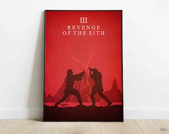 May include: Framed poster with a red background depicting a lightsaber duel between two figures in silhouette. The text "III REVENGE OF THE SITH" is at the top. The poster is in a black frame and rests against a white wall.