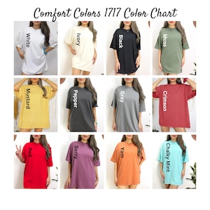 May include: Color chart showing 12 different colors of Comfort Colors 1717 t-shirts. The colors are: White, Ivory, Black, Moss, Mustard, Pepper, Gray, Crimson, Red, Berry, Yam, and Chalky Mint.