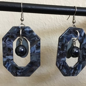 Dark blue & grey acetate open design pierced earrings with dark blue bead and flat gray oval back