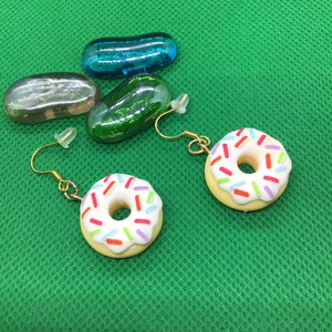 Yellow cake donut pierced earrings with red, green, blue & purple sprinkles