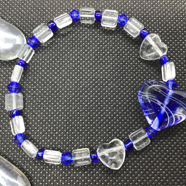 Royal blue & clear glass blown heart shaped beaded stretch bracelet with clear heart, rectangles and blue bicone diamond beads