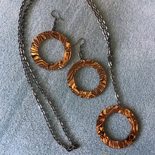 Orange & black acetate open circle design and gunmetal chain necklace and matching earring set