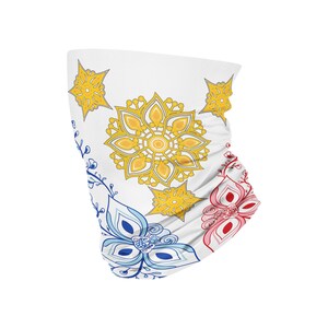 May include: A white face mask with a colorful floral pattern. The pattern features yellow, red, and blue flowers with intricate details.