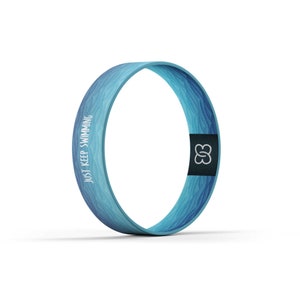 May include: Blue and green patterned silicone wristband with the text "JUST KEEP SWIMMING" and a small infinity symbol.