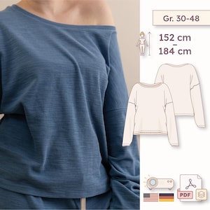 Könnte beinhalten: Ein blaues Langarmshirt mit weitem Ausschnitt. Das Bild enthält eine technische Schnittmuster-Illustration für die Größen 30-48, geeignet für Körpergrößen von 152 cm bis 184 cm. Symbole zeigen die Verfügbarkeit als PDF-Datei und Beamer-Kompatibilität.