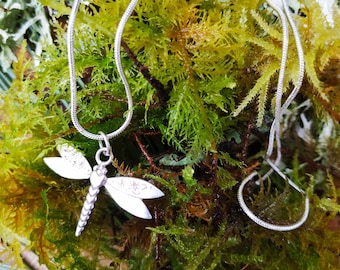 Engraved sterling silver dragonfly pendant with hearts. The perfect mother's day gift.