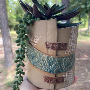 Pottery planter, wrap style, asymmetrical, naked clay with colorful glazes, funky pot