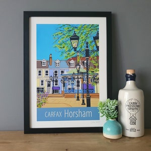 Horsham Carfax travel poster print in black frame by Susie West