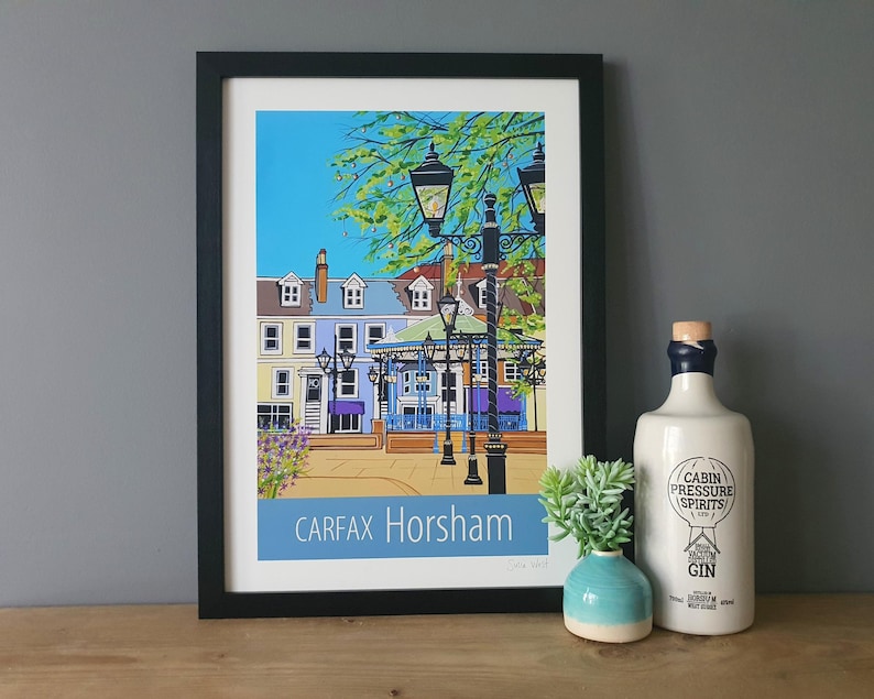 Horsham Carfax travel poster print in black frame by Susie West