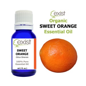 May include: A blue glass bottle with a white cap, labeled "Exist Organic Sweet Orange Essential Oil" and "Citrus Sinensis 100% Pure Essential Oil ml (fl. oz.)". A whole orange fruit is shown next to the bottle.