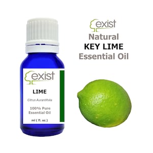 May include: A blue glass bottle with a white cap, labelled "Exist Natural KEY LIME Essential Oil". The bottle contains 100% pure lime essential oil. A green lime fruit is shown next to the bottle.
