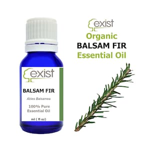 May include: A blue glass bottle with a white cap, labeled "Exist Organic Balsam Fir Essential Oil" and "Abies Balsamea 100% Pure Essential Oil". A sprig of balsam fir is shown to the right.