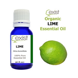 May include: A blue glass bottle with a white cap, labeled "exist Organic LIME Essential Oil" and "LIME Citrus Aurantifolia 100% Pure Essential Oil ml (fl. oz.)". A green lime fruit is shown next to the bottle.
