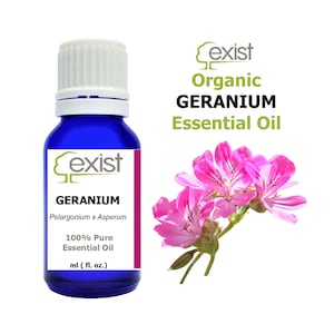 May include: A blue glass bottle with a white cap, labelled "Exist Organic Geranium Essential Oil". The bottle contains 100% pure geranium essential oil. The label also includes the botanical name "Pelargonium x Asperum". A pink geranium flower is shown in the background.