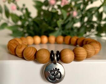Sandalwood mala bracelet, 8mm wood beads, om charm, aromatic meditation mala, yoga gift, prayer beads, relaxation, calming mala