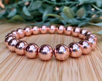 Hematite Rose Gold mala bracelet, 8 mm gemstones, metalic lustre stones, smooth gemstones, stretchy mala,  friendship bracelet, wrist mala