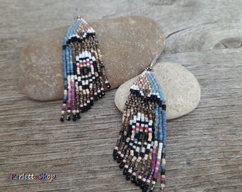 long earrings with fringe, butterfly, and beadwork
