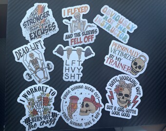 May include: Nine colourful stickers with humorous fitness-themed quotes and illustrations. The stickers feature skeletons, dumbbells, coffee cups and skulls.