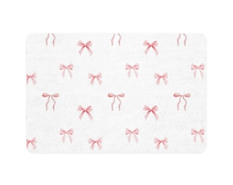 Tapete rosa con lazo para comida de mascotas / Mantel individual antideslizante para comedero de perro o gato (30 x 45 cm)