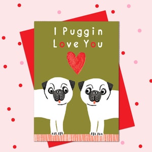 May include: A Valentine's Day card with two pugs and a red heart. The card has a green background and the text "I Puggin Love You".