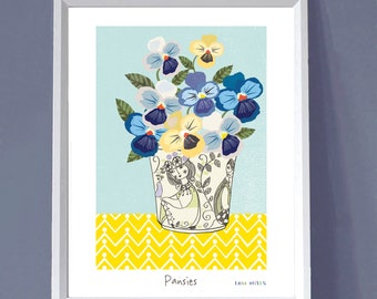 May include: A framed print of a colorful illustration of a bouquet of purple, yellow, and blue pansies in a white ceramic vase with a floral pattern. The vase is sitting on a yellow chevron patterned surface. The print is titled "Pansies" and signed "Lou Wills".