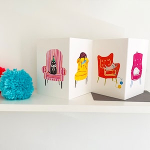 Carte concertina Cheeky Cats illustrée de chats amusants, carte de voeux
