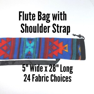 May include: A flute bag with a shoulder strap featuring a blue, red, and orange geometric pattern. The bag measures 12.7 cm wide by 71.1 cm long. Text on the image reads: Flute Bag with Shoulder Strap, 5" Wide x 28" Long, 24 Fabric Choices.