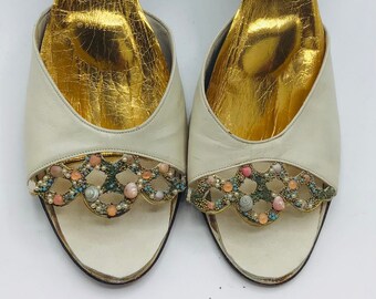 Vintage 1950 Springolators Cream Sandals with seashells decorations.