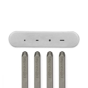 May include: Four metal letter stamps with the word "ImpressArt" engraved on each. The stamps are arranged in a row on a white background. A silver metal bar with three indentations is above the stamps.