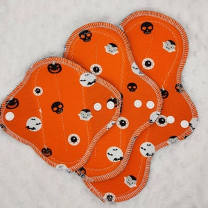 Ready to ship Classic Halloween cotton jersey topper, cloth pad, serged pad, reusable, washable pad.